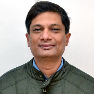 Dr. Manu Rajan
